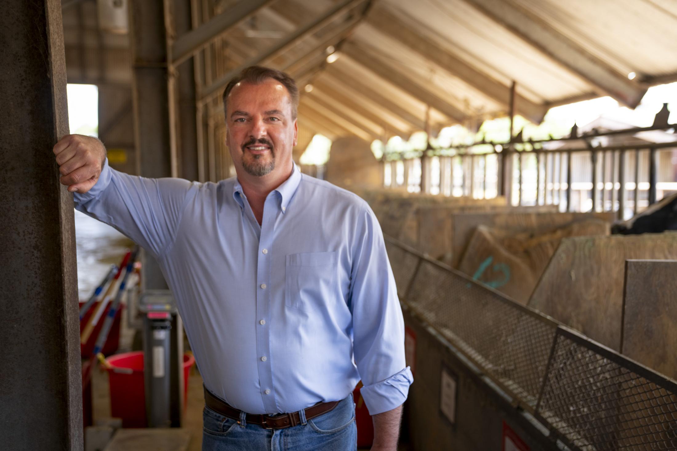 Dr. Frank Mitloehner at the UC Davis dairy, where his team conducted a study on a feed additive to reduce enteric emissions in dairy cattle. 