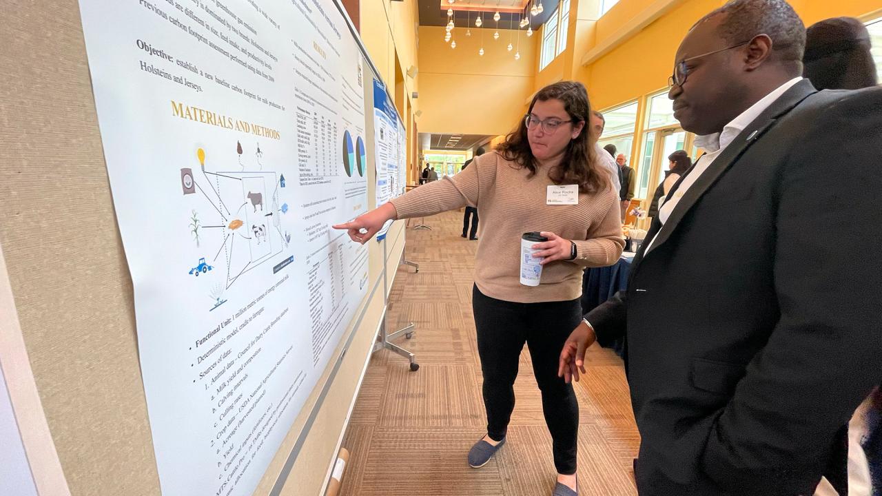 UC Davis CLEAR Center Ph.D. student Alice Rocha shares her research with United Nations Food and Agriculture Organization Livestock Policy Officer, Aimable Uwizeye, at the State of the Science Summit - Feed Strategies to Reduce Enteric Emissions. The event was held at UC Davis on May 2 and 3, 2023. 